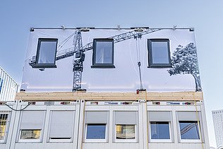 Foto von Außenansicht Holzcontainer